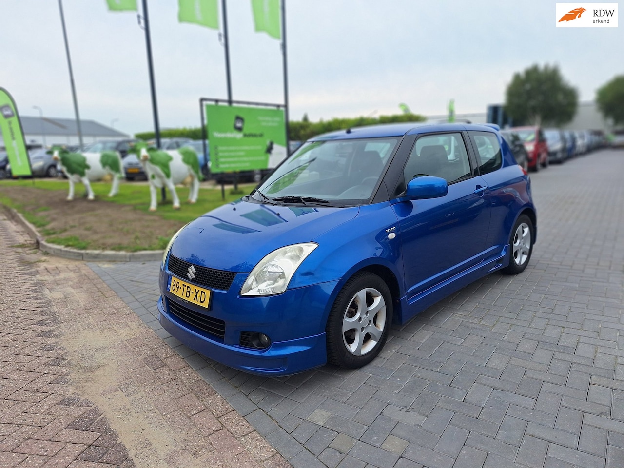 Suzuki Swift - 1.5 Exclusive / Sportieve auto / APK oktober 2027 - AutoWereld.nl