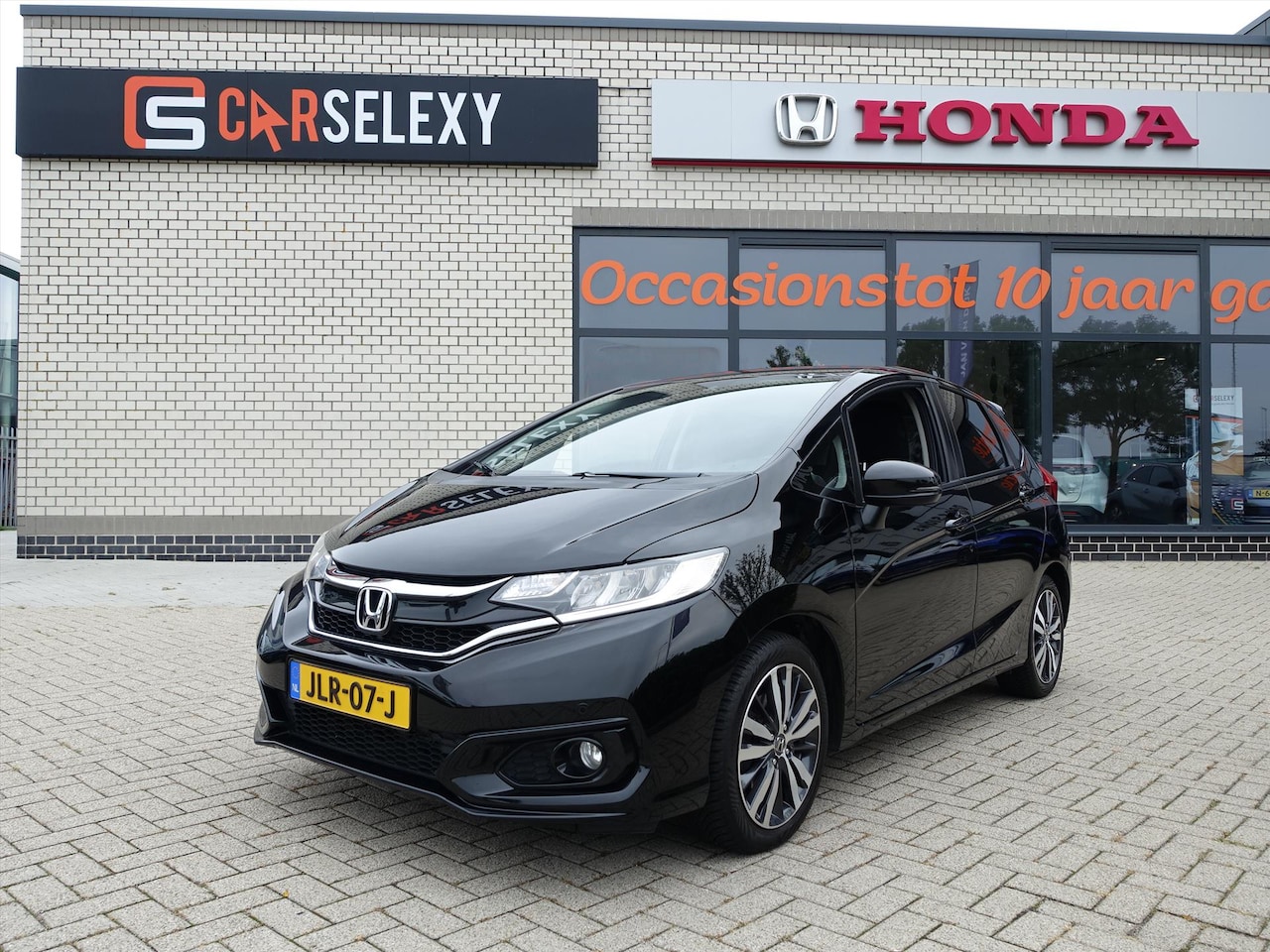 Honda Jazz - 1.3 i-VTEC 102pk CVT Elegance + 4 Seizoenenbanden en Verlichte Instaplijsten en Spoiler en - AutoWereld.nl
