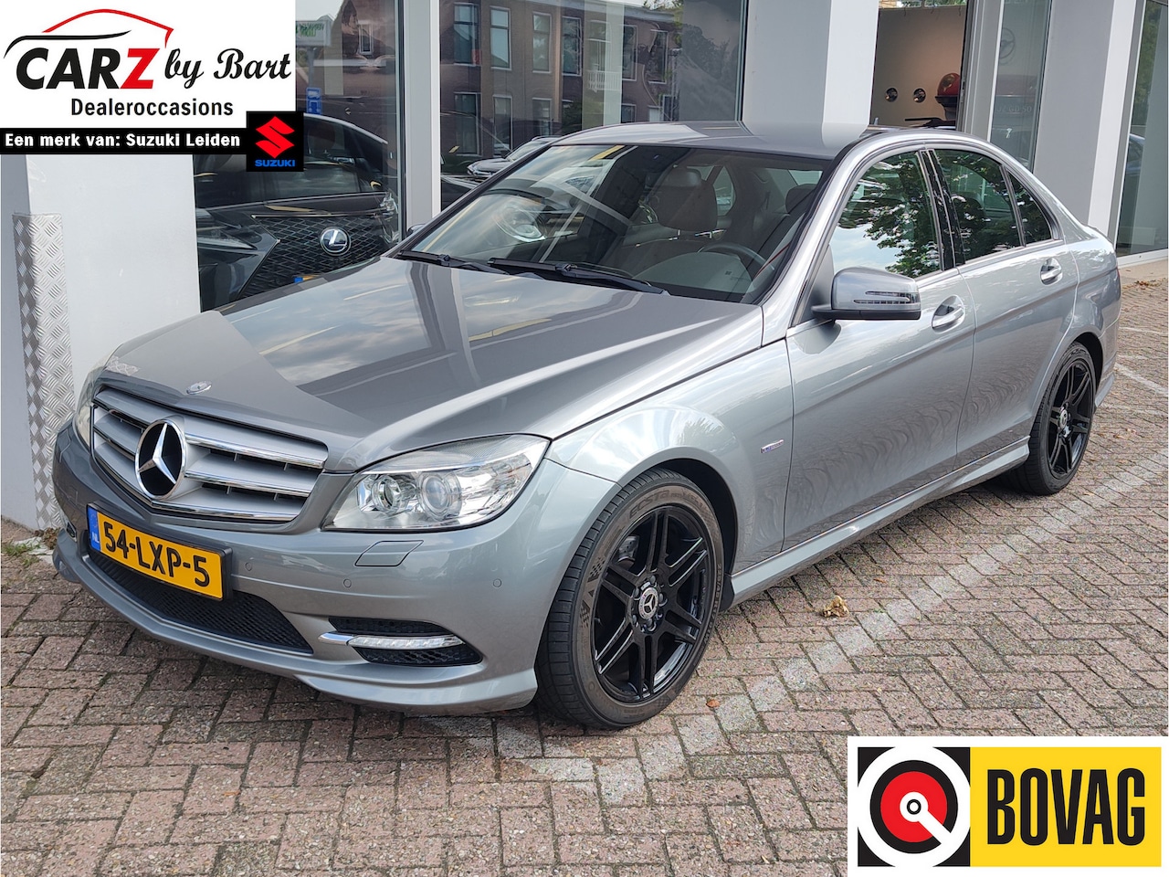 Mercedes-Benz C-klasse - 180 CGI Bl.E. BUS. CLASS AVANTGARDE AMG AUT. Houtinleg | Stage 1 | Airco achter | + Winter - AutoWereld.nl
