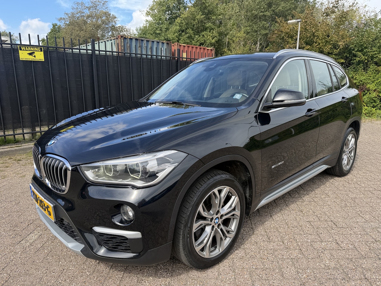 BMW X1 - sDrive20i Centennial High Executive Leer/HU/Navigatie/LMV - AutoWereld.nl