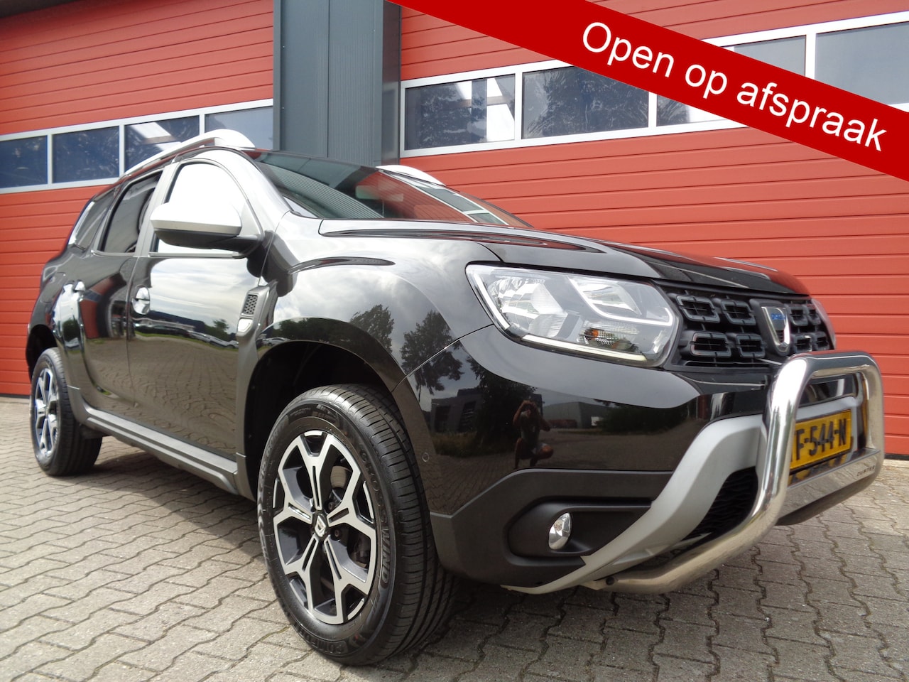 Dacia Duster - 1.2 TCe Prestige 126Pk Clima Cruise Navi 6-BAK LMV NL-Auto 2E-Eigenaar - AutoWereld.nl