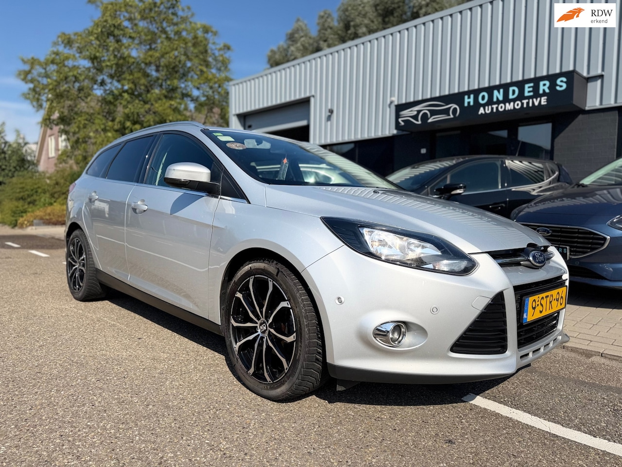 Ford Focus Wagon - 1.6 TDCI ECOnetic Lease Titanium | TREKHAAK | NEW DISTRIBUTIE | NAP | VOORRUITVERW | RIJD - AutoWereld.nl