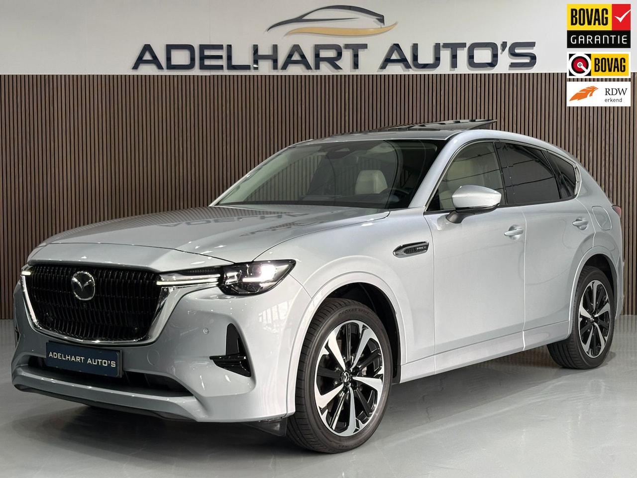 Mazda CX-60 - 2.5 e-SkyActiv PHEV Takumi Plus / Panorama dak / Lederen interieur / Elektrische stoelen / - AutoWereld.nl