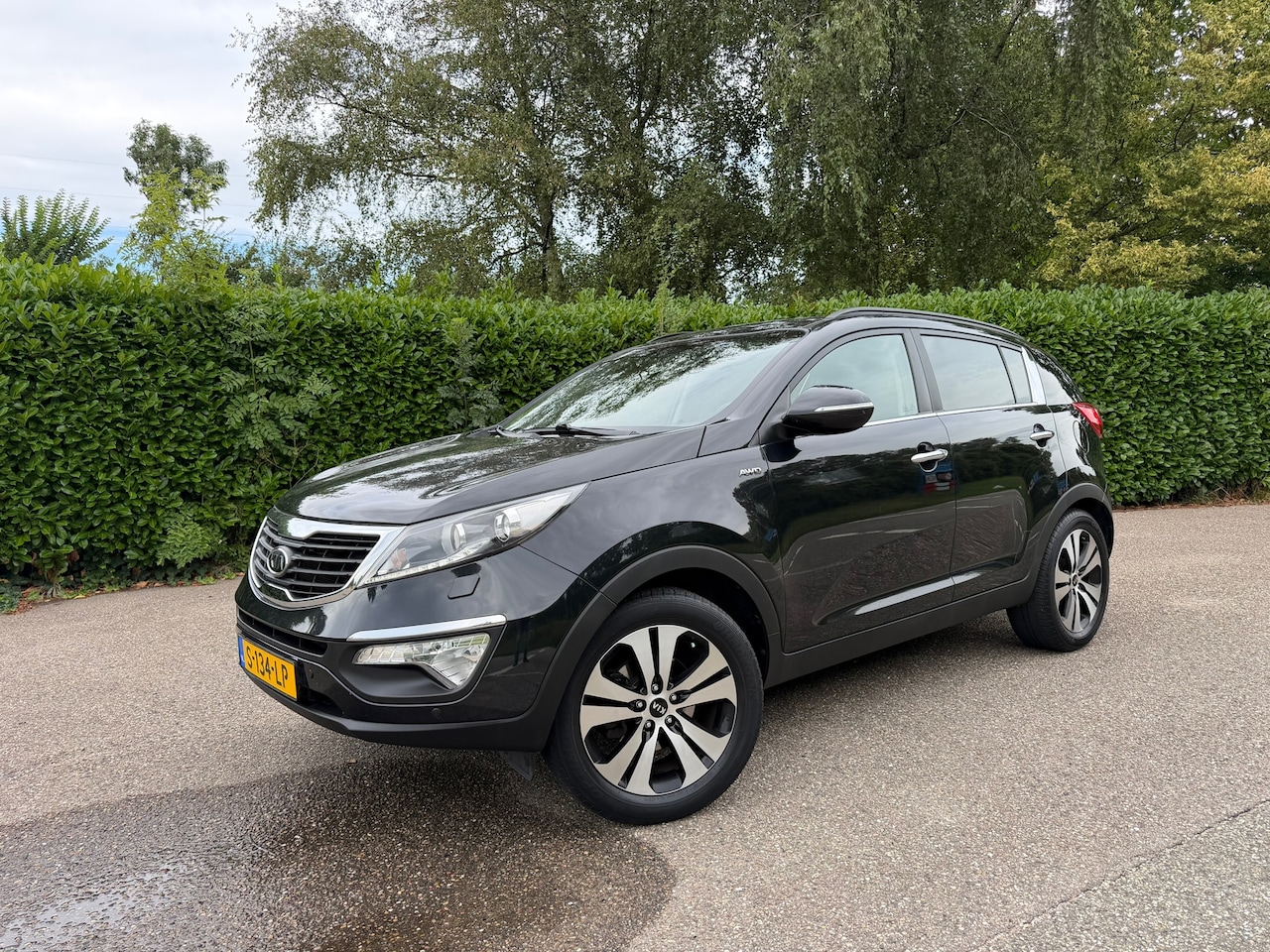 Kia Sportage - 2.0 X-clusive 4wd | Automaat - AutoWereld.nl