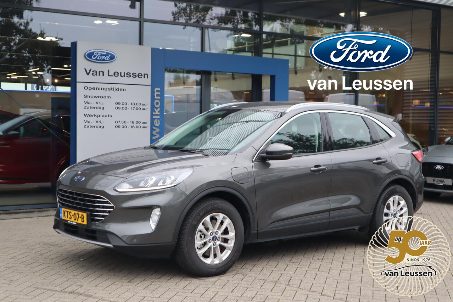 Ford Kuga - 2.5 PHEV TITANIUM KEYLESS CLIMA WINTERPACK PARK-SENSOREN CAMERA LED ALL-SEASON - AutoWereld.nl