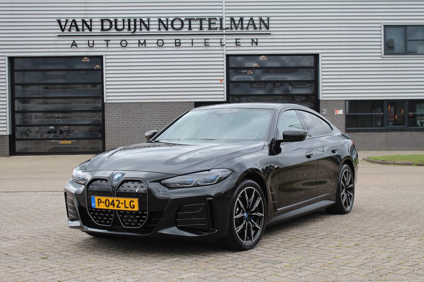 BMW i4 - eDrive40 High Executive 84 kWh / Harman Kardon / SOH 94.3% / N.A.P. - AutoWereld.nl