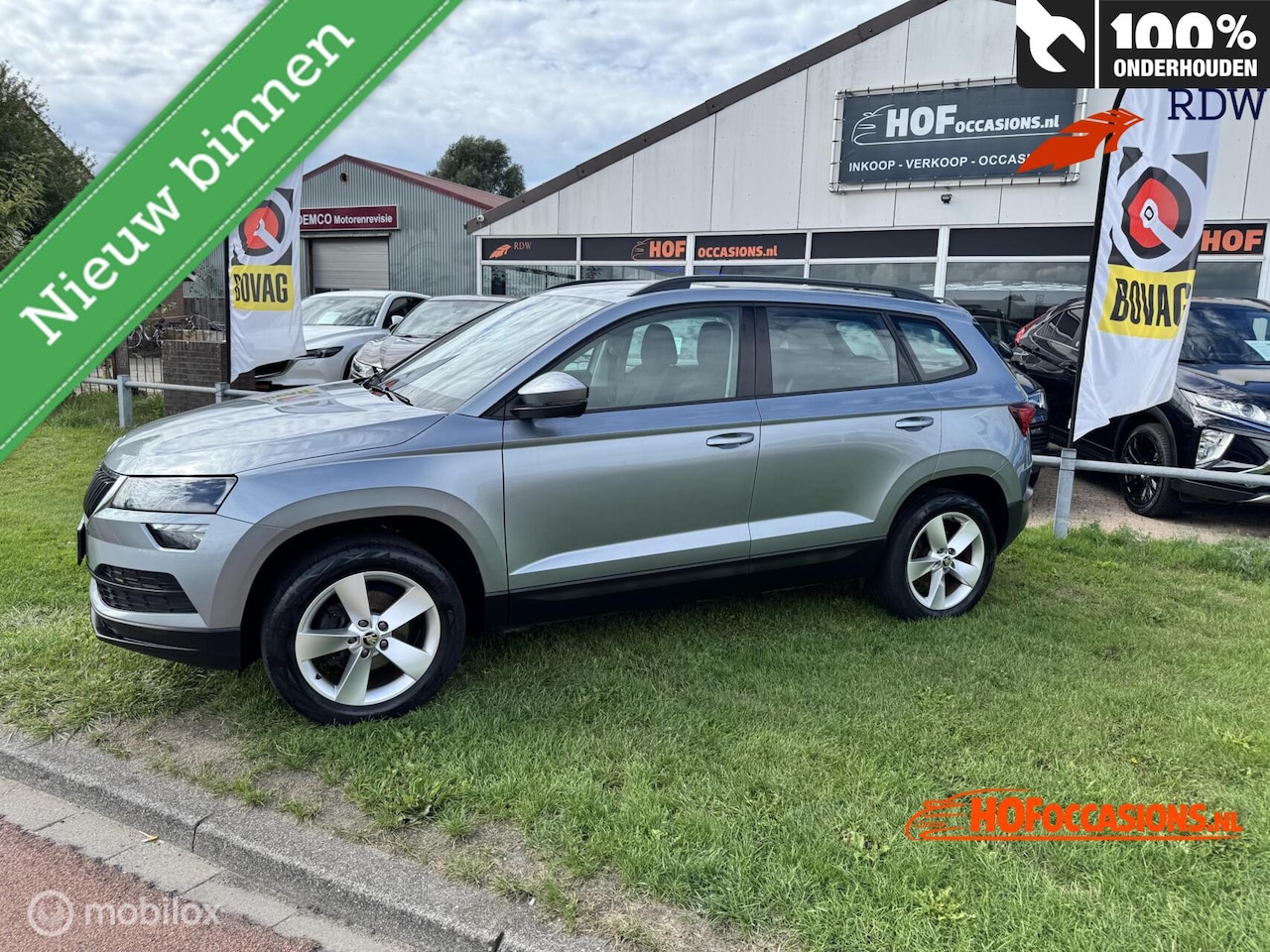 Skoda Karoq - 1.0 TSI Business Edition Plus STOELVERW/TREKHAAK - AutoWereld.nl