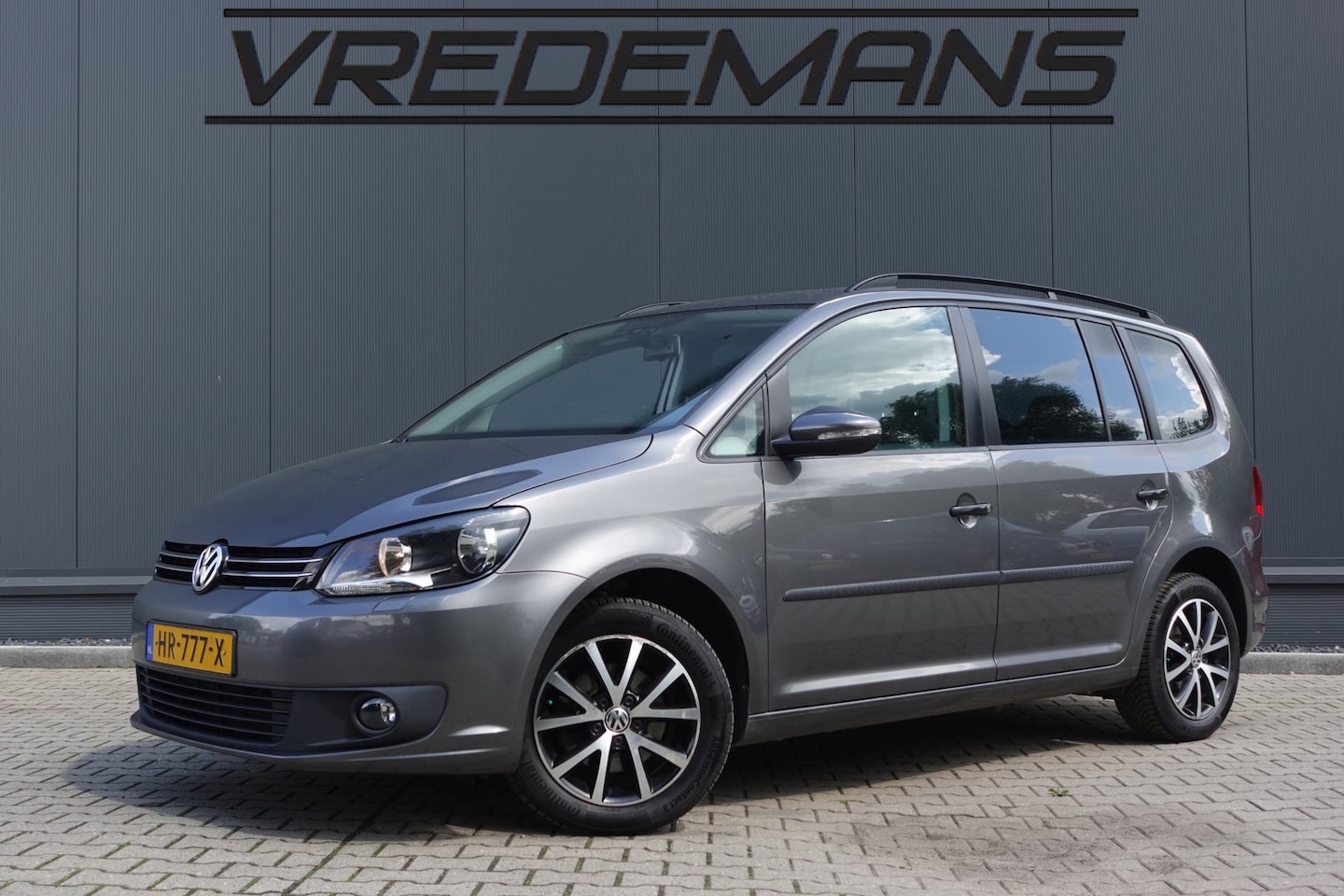 Volkswagen Touran - 1.6 TDI Highline BlueMotion 7p. 1.6 TDI Highline BlueMotion 7p. - AutoWereld.nl