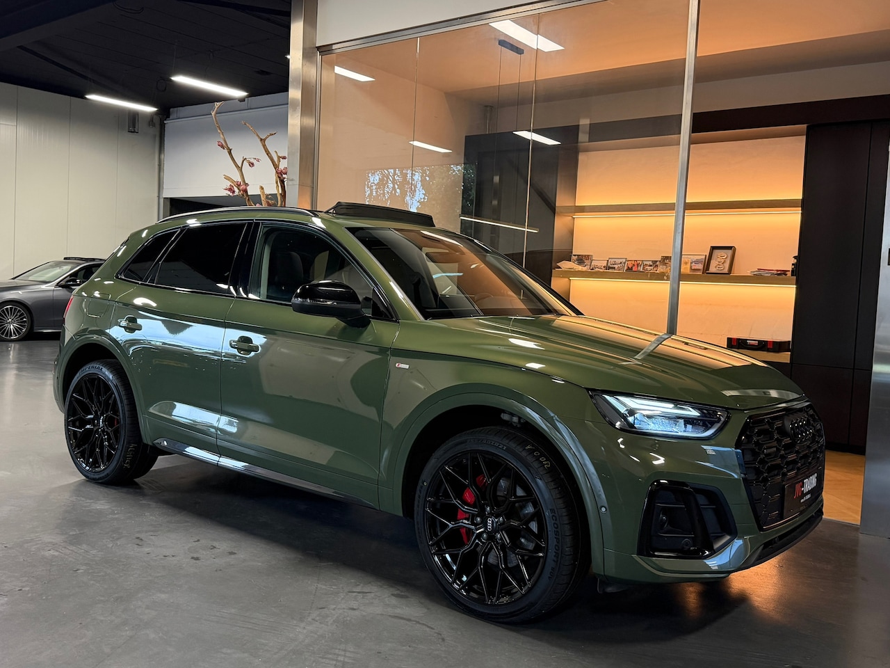 Audi Q5 - 50 TFSI E 299PK Quattro S line hybride 2021 garantie / district green - AutoWereld.nl