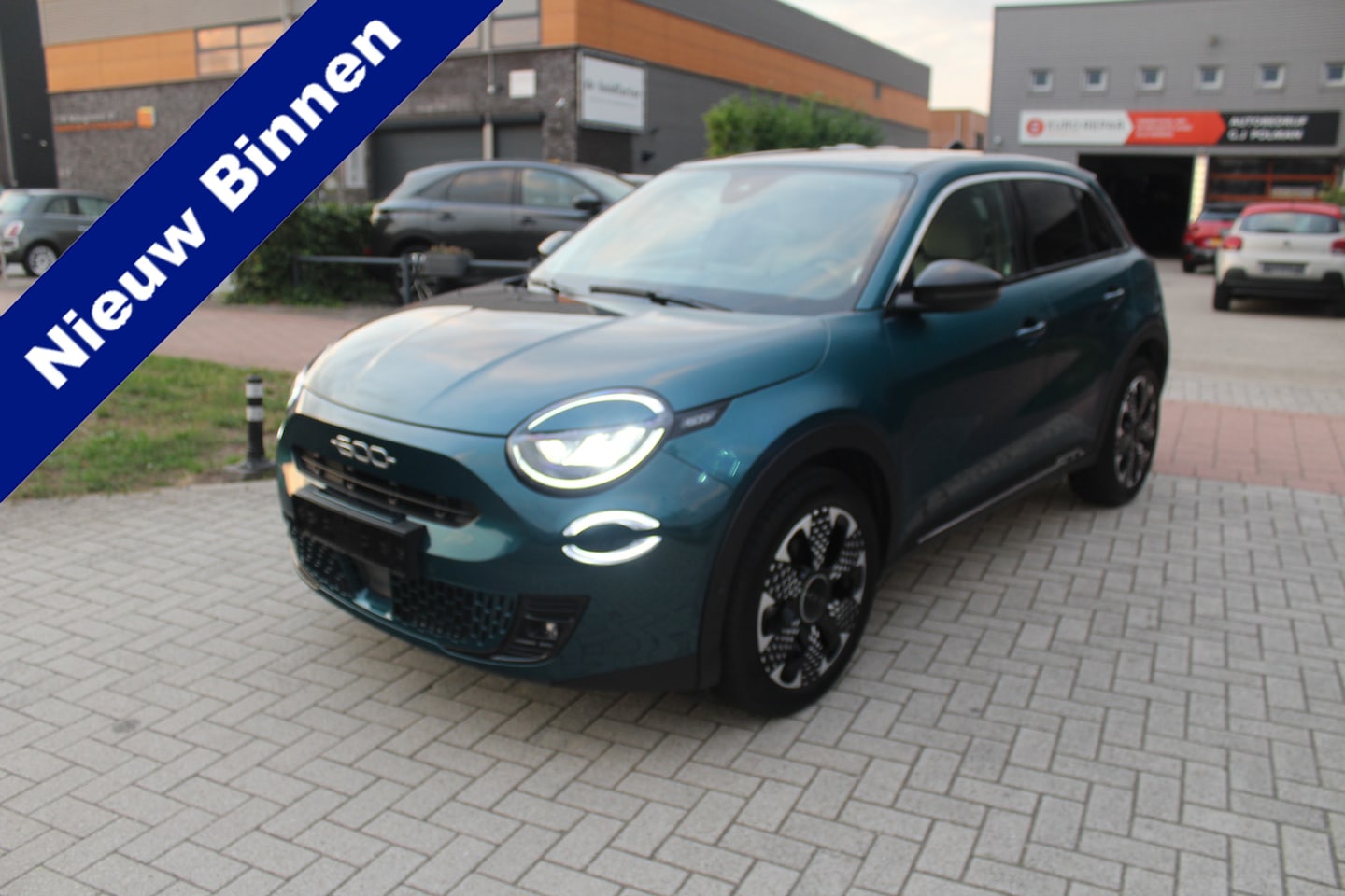 Fiat 600e - La Prima 54 kWh Leder-Clima-Cruise-Navi-Camera-Massage SOH 96,4 % - AutoWereld.nl