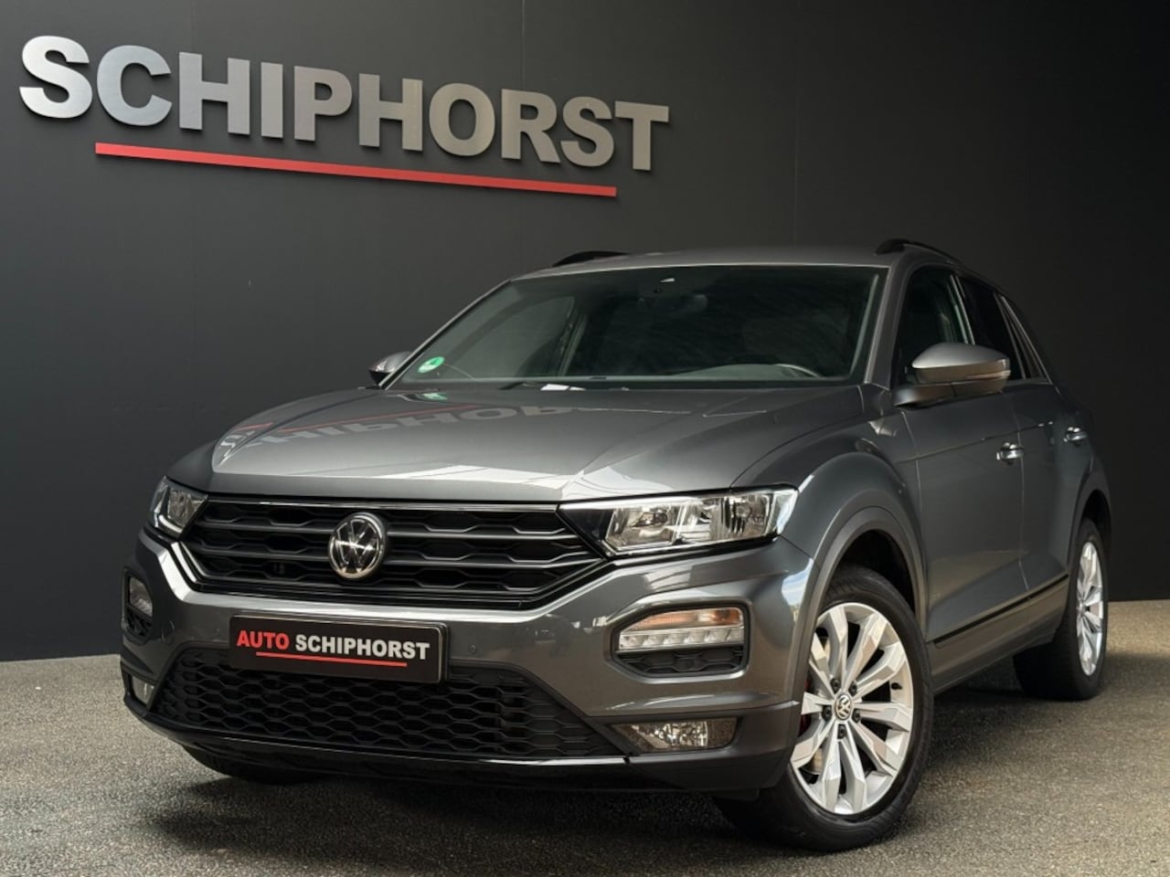 Volkswagen T-Roc - 1.5 Tsi DSg Sport/navi/18inch/zwarte hemel/stoelverwarming/black optic - AutoWereld.nl