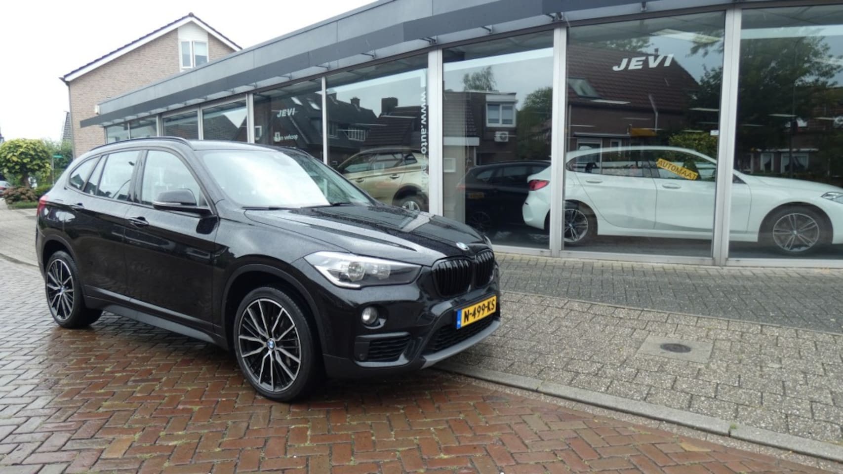 BMW X1 - 1.8 I  SDRIVE /  PERFORMANCE   * NAVI * CRUISE * L.M.V 19 * STOELVERWARMING * - AutoWereld.nl
