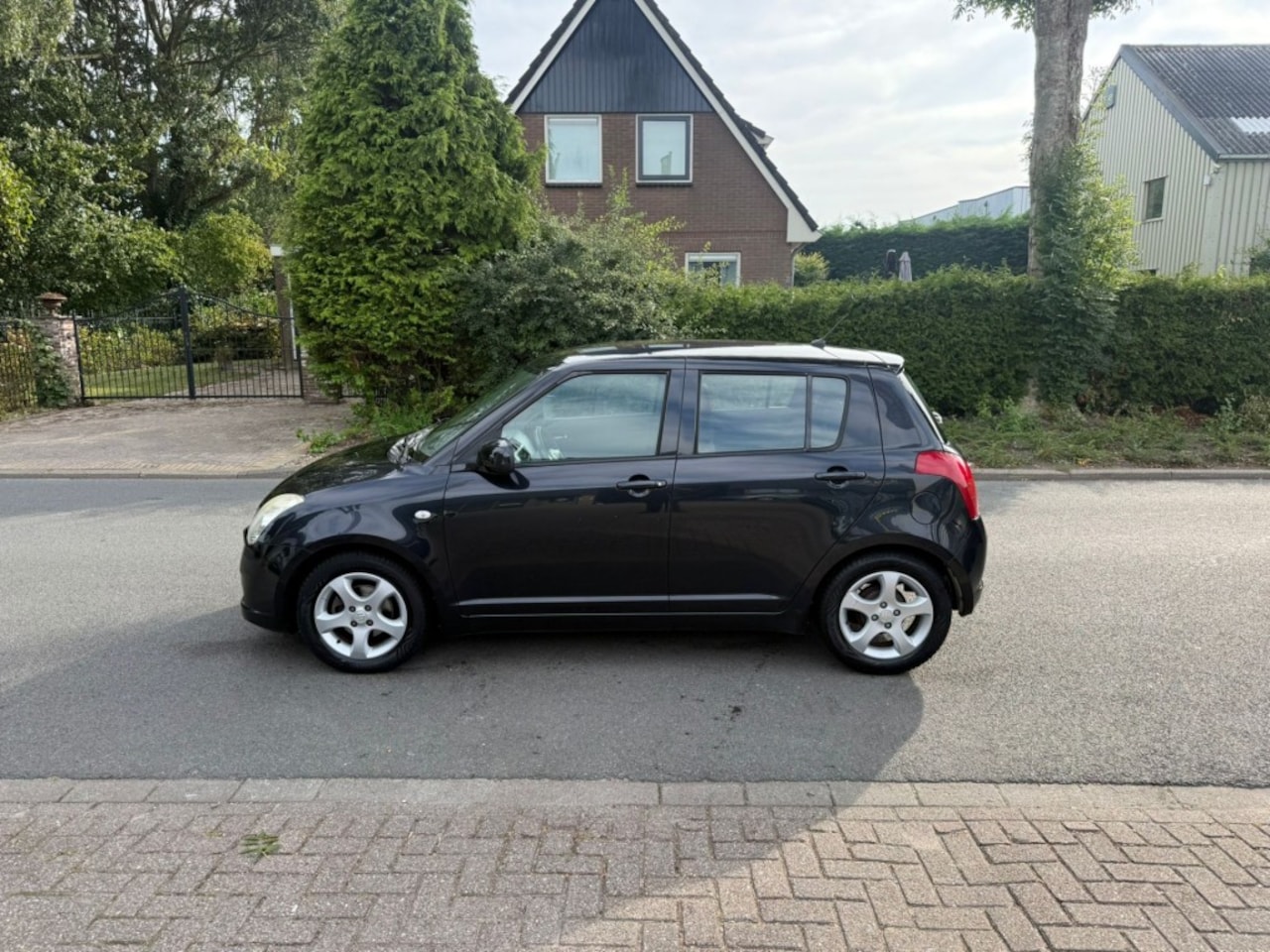 Suzuki Swift - 1.3 Shogun/airco/lichtmetaal/NAP - AutoWereld.nl