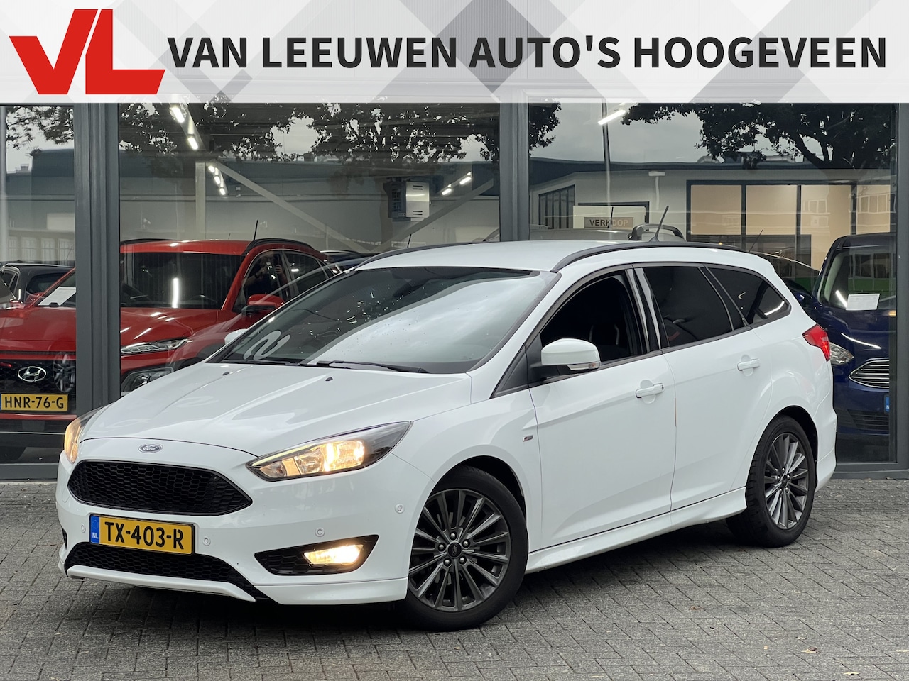 Ford Focus Wagon - 1.0 ST-Line | Nieuw binnen | Stoel en stuurverwarming | Navi | PDC | 141 PK - AutoWereld.nl
