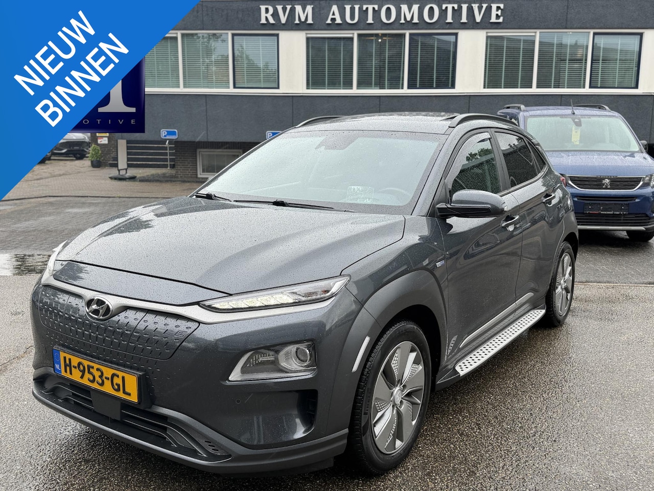 Hyundai Kona Electric - EV Premium 64 kWh SOH 94% | ORIGINEEL NL AUTO | 3-FASE LADEN | WARMTEPOMP| SCHUIFDAK | LER - AutoWereld.nl