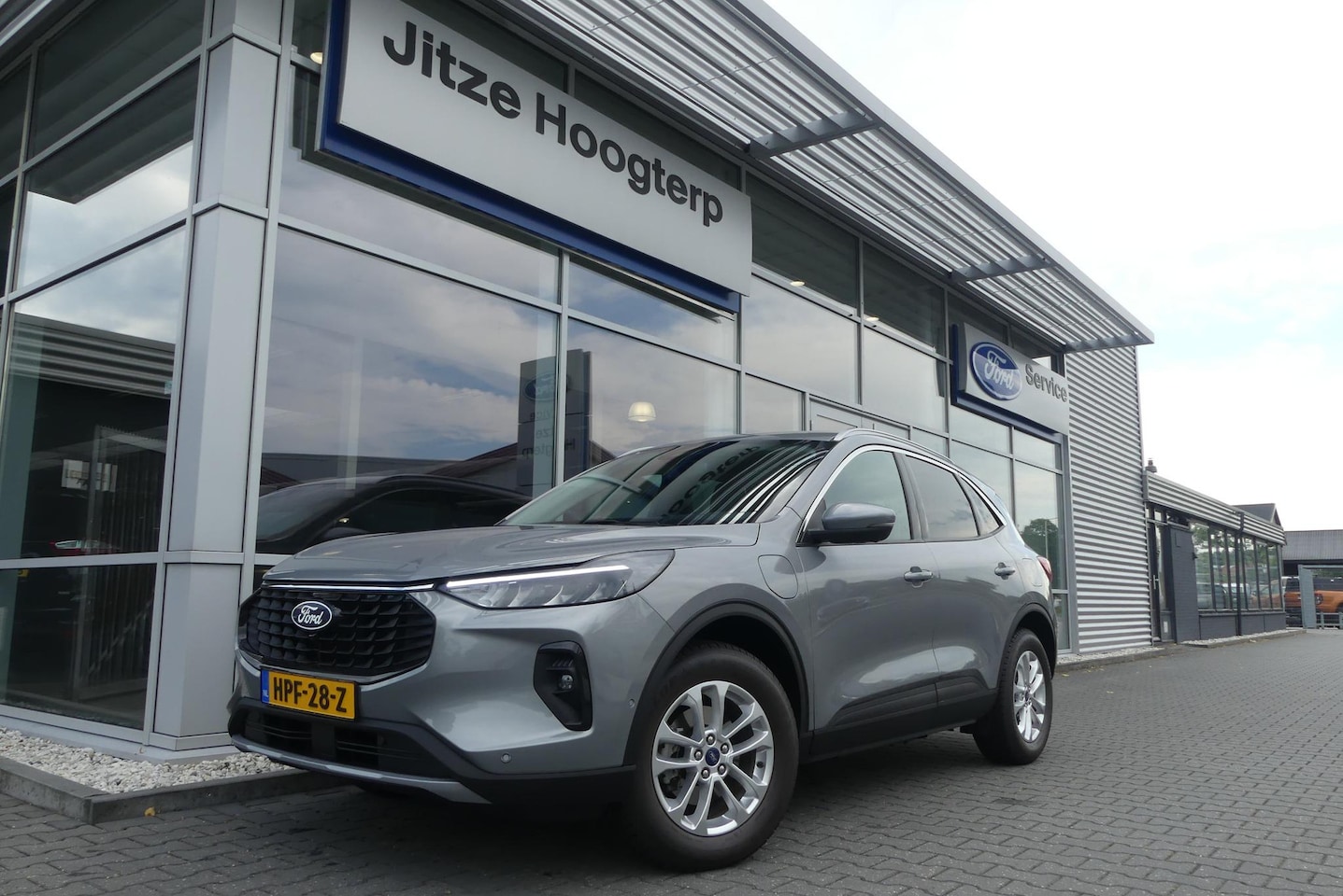 Ford Kuga - 2.5 PHEV TITANIUM ELEKT. TREKHAAK, 360° CAMERA, WINTER PACK, ADAPT. CRUISE, CLIMA, NAVI, P - AutoWereld.nl