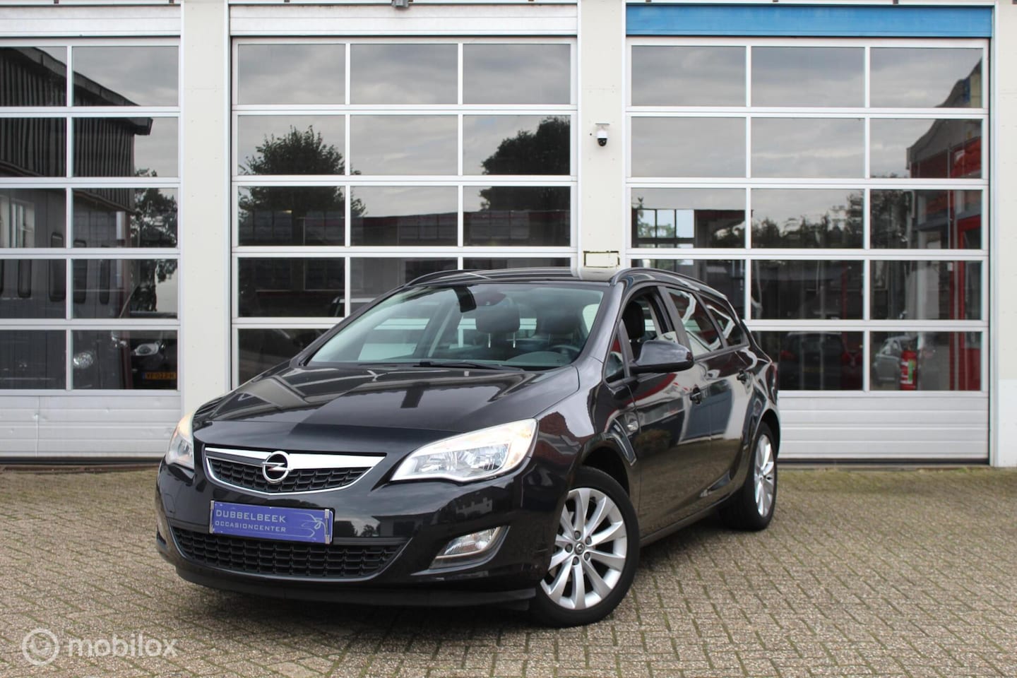 Opel Astra Sports Tourer - 1.4-16V 140PK 6-BAK Turbo Anniversary Edition/COSMO *NAVIGATIE* *CLIMATE CONTROL (AIRCO)* - AutoWereld.nl