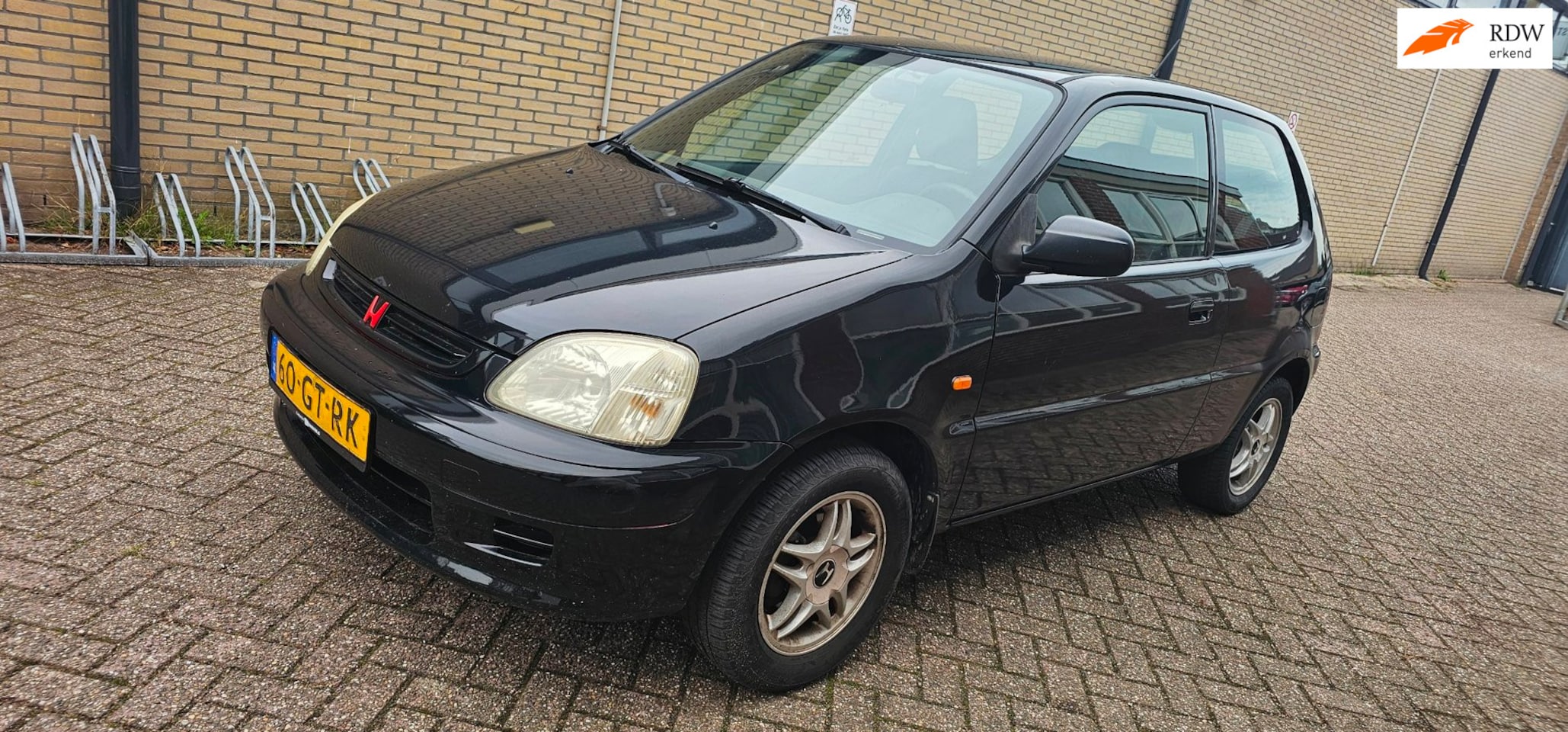 Honda Logo - 1.3i 1.3i - AutoWereld.nl