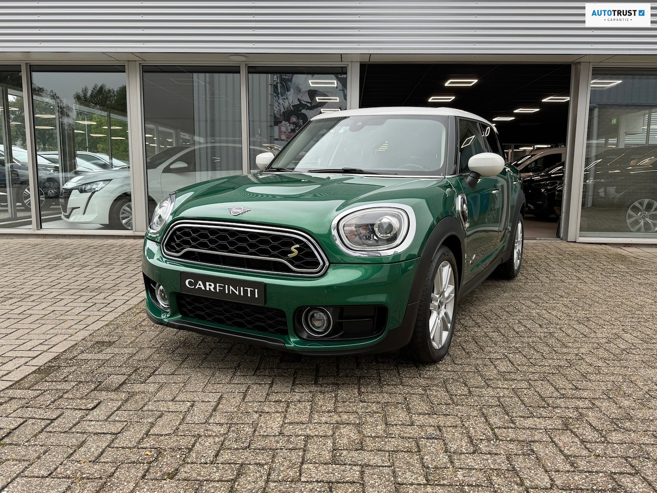 MINI Countryman - 1.5 Cooper S E ALL4 225 Pk | Navigatie | Cruise | Camera | Clima | HalfLeder | Led | 18'. - AutoWereld.nl