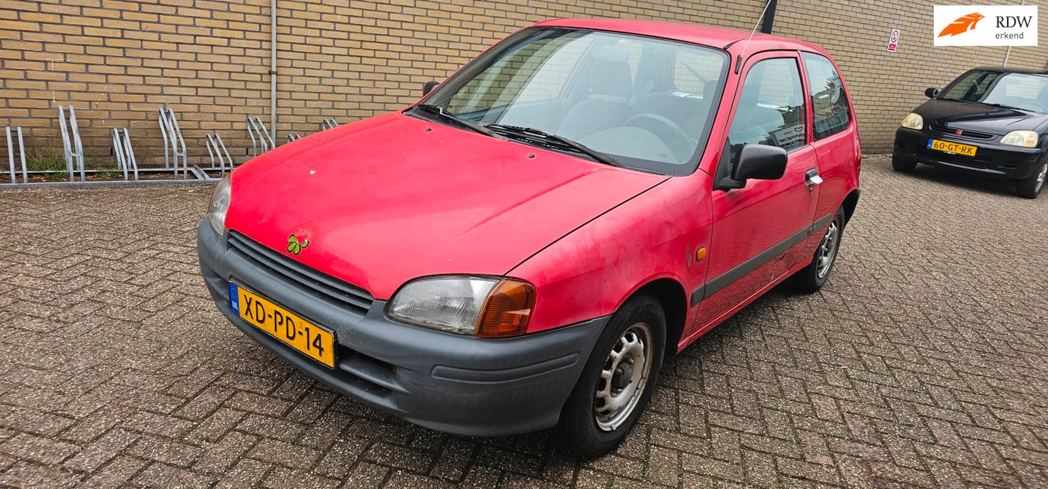Toyota Starlet - 1.3-16V automaat invalide - AutoWereld.nl