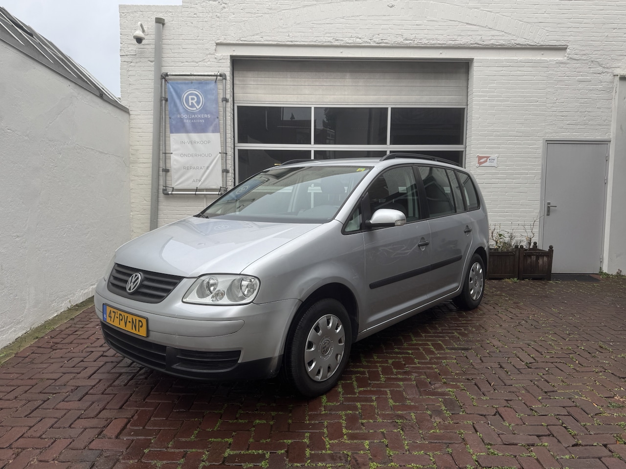 Volkswagen Touran - 1.6-16V FSI Turijn 7P/Navi/Clima/Cruisecontrol/Trekhaak - AutoWereld.nl