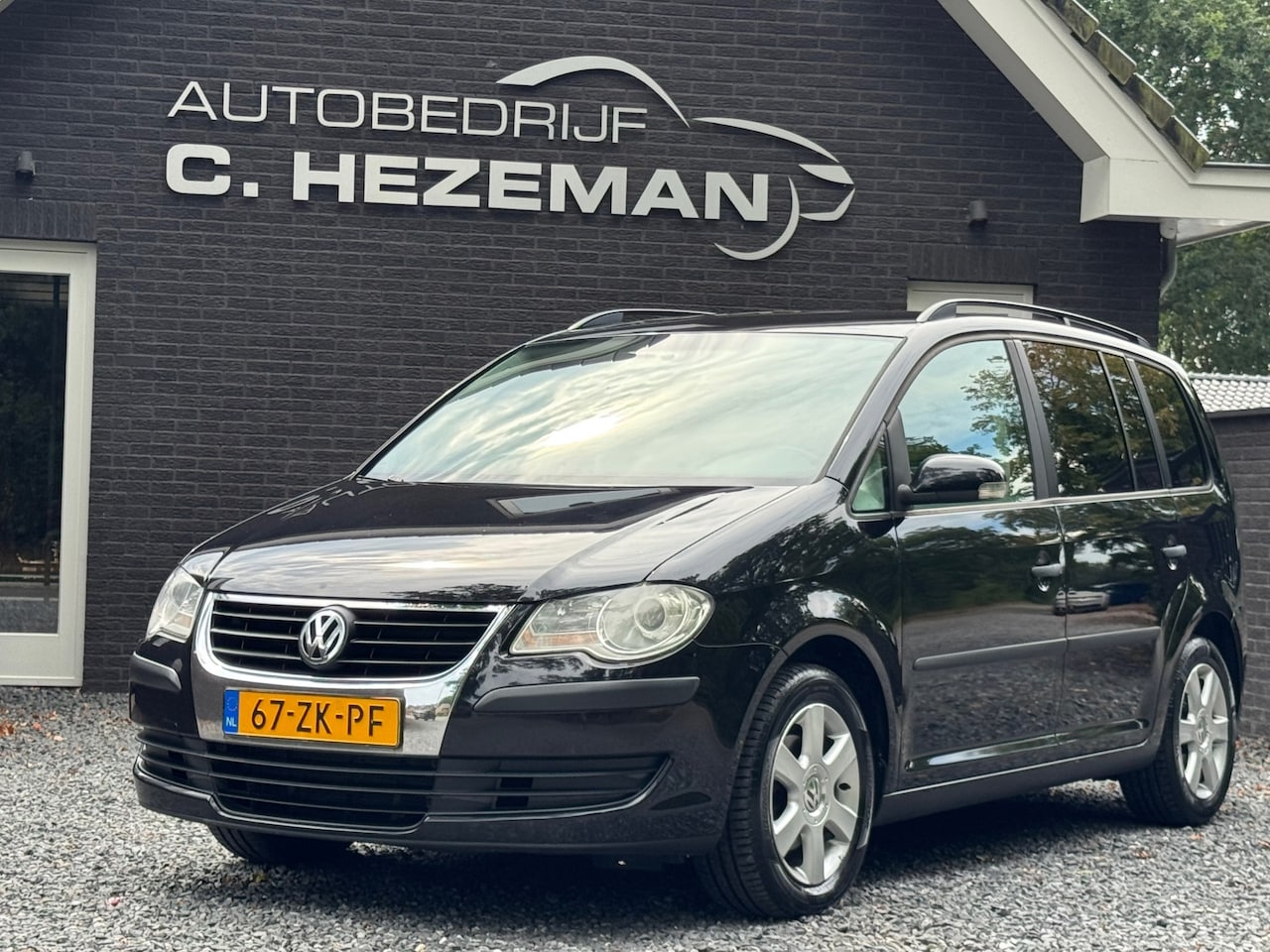 Volkswagen Touran - 1.4 TSI Optive 7 persoons zeer goed onderhouden Cruise & Climate Control Trekhaak Sportvel - AutoWereld.nl