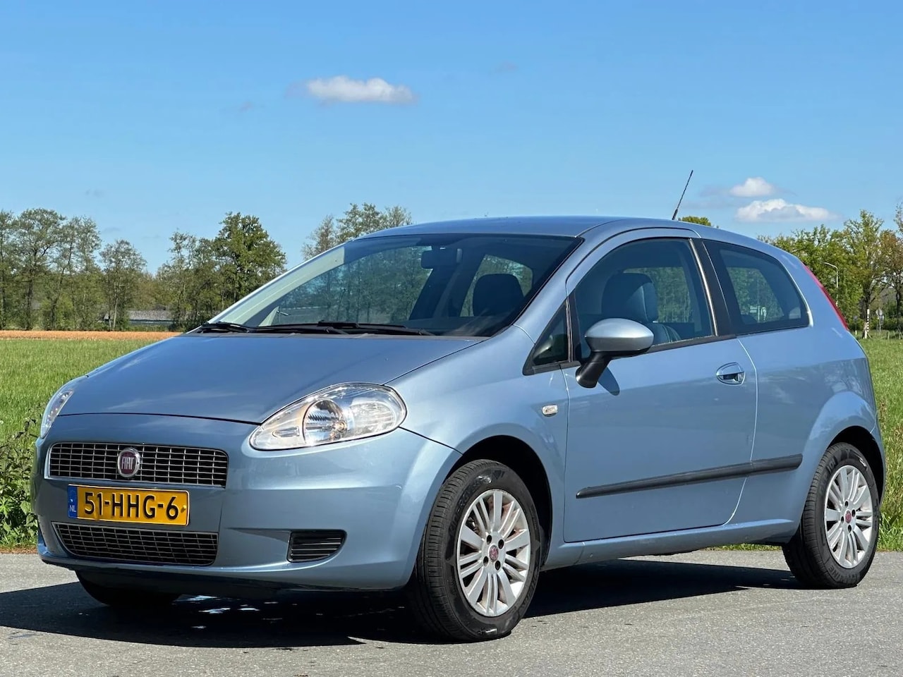 Fiat Grande Punto - 1.4 Edizione Lusso | Lees Tekst - AutoWereld.nl