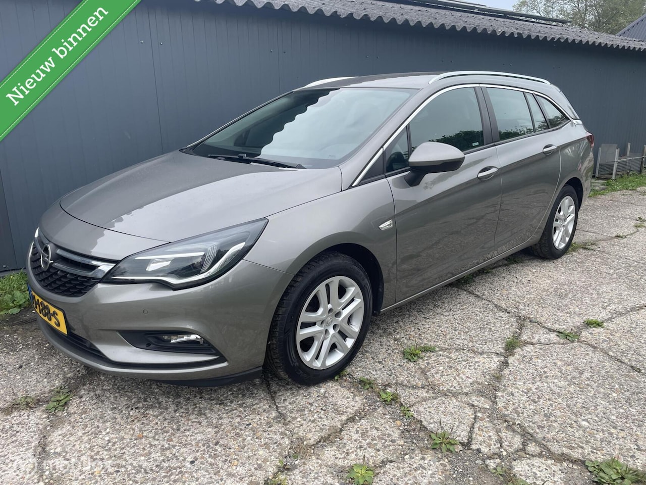Opel Astra Sports Tourer - 1.0 Online Edition Airco Trekhaak Cruise - AutoWereld.nl