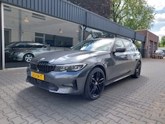 BMW 3-serie Touring - 330e Business Edition Plus 19 inch Sportstoelen Leer Clima Cruise Stoelverwarming