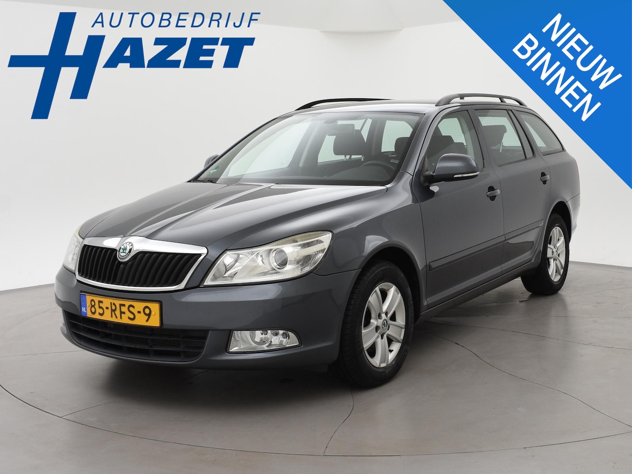 Skoda Octavia Combi - 1.2 TSI AMBITION + TREKHAAK | NAVIGATIE | CLIMATE | CRUISE CONTROL - AutoWereld.nl