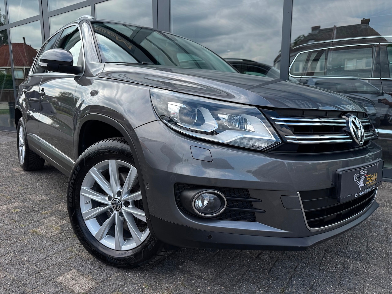 Volkswagen Tiguan - 1.4 TSI Sport&Style Automaat | Camera - AutoWereld.nl
