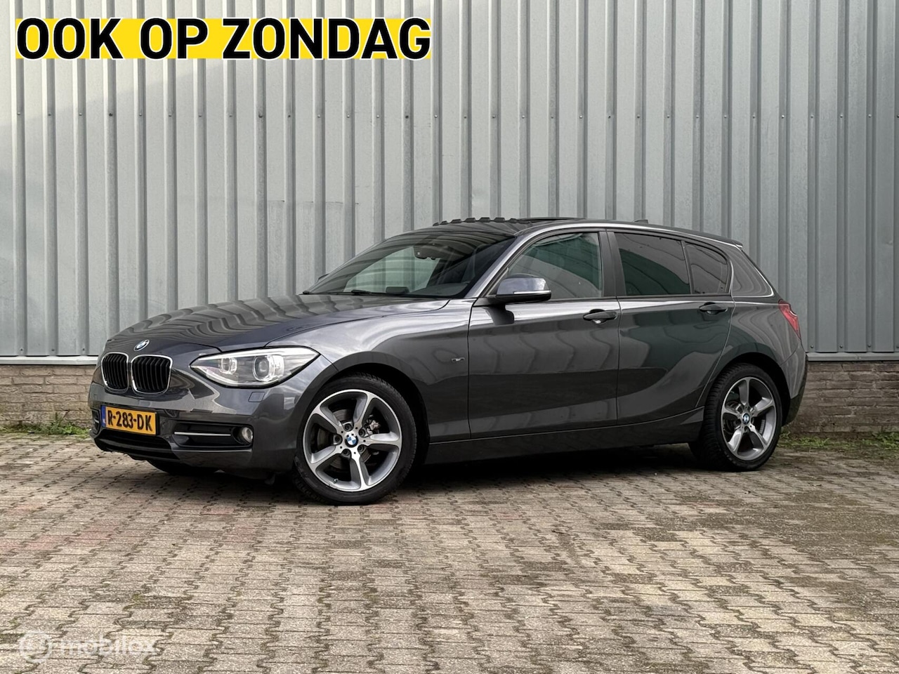 BMW 1-serie - 116i Sport High Executive | Schuifdak | Climate - AutoWereld.nl