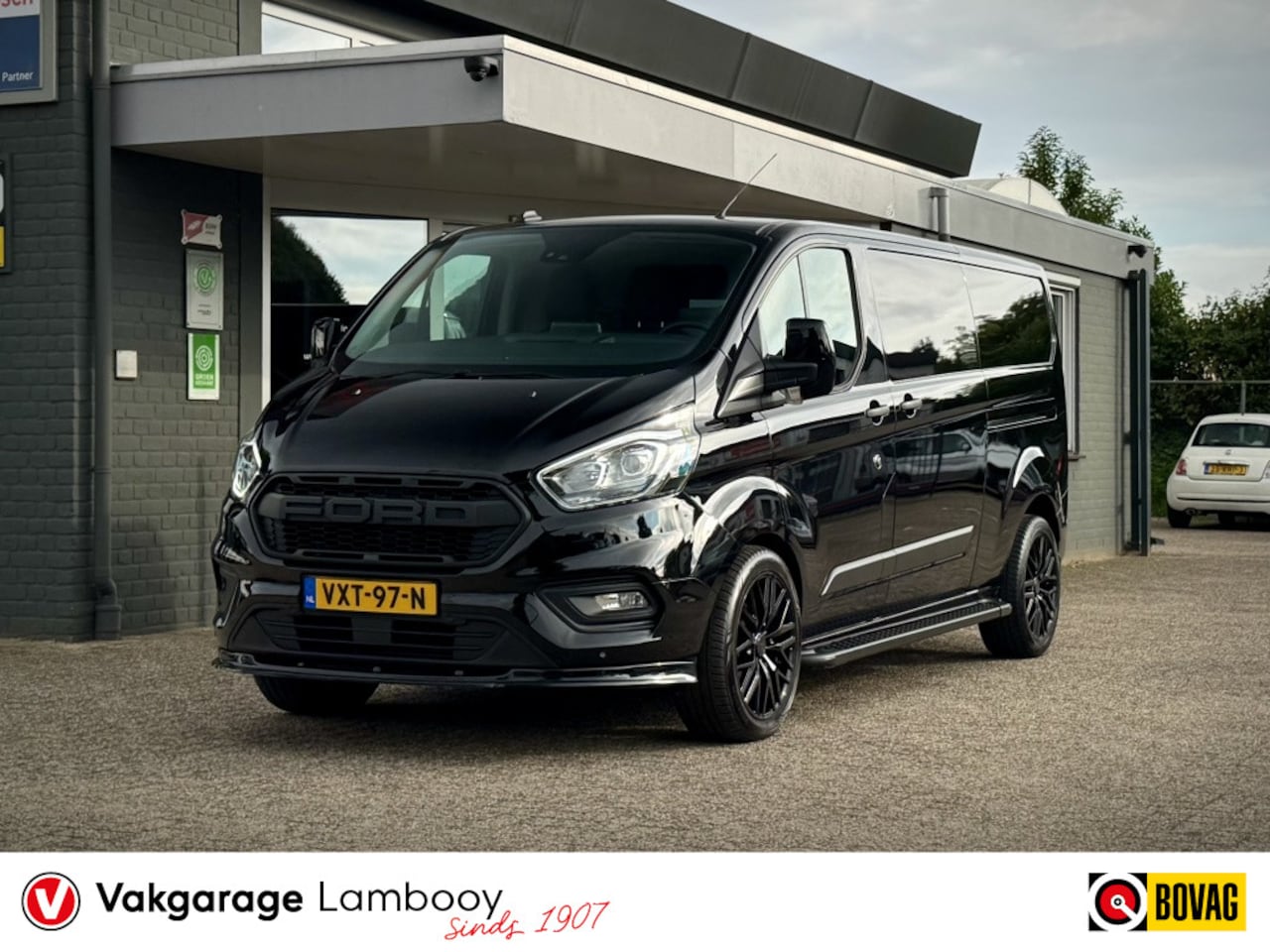Ford Transit Custom - 340 2.0 TDCI L2H1 130PK Standkachel Trekhaak Camera Leder Stoelverwarming - AutoWereld.nl