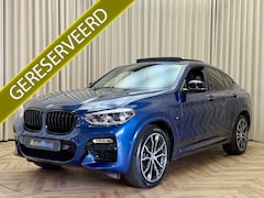 BMW X4 - xDrive20i *M-Sport* Phytonicblau / Panoramadak / Leder / HUD / Stoelverwarming / Camera /