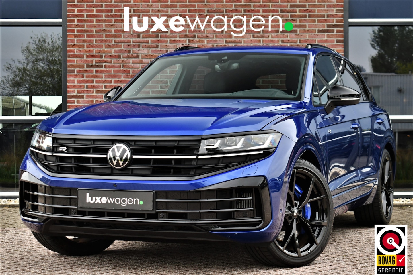 Volkswagen Touareg - 3.0 TSi eHybrid 4M R Trekh DynAudio Stoel-koel Massage HUD 360 - AutoWereld.nl