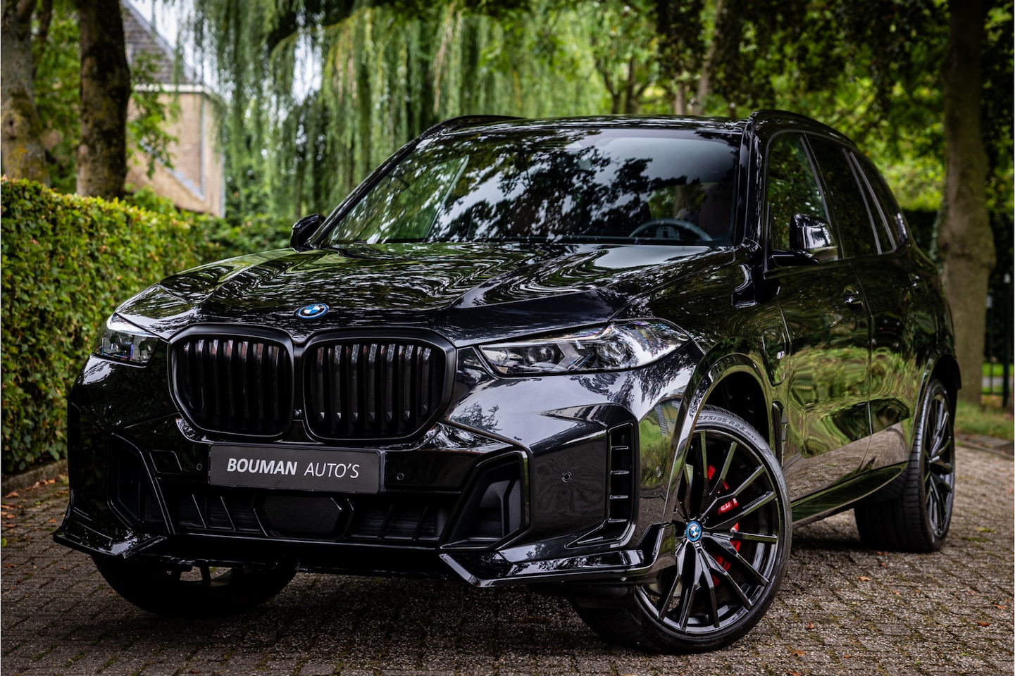BMW X5 - xDrive50e M Sport Pro Bowers & Wilkins Sky Lounge Massage Crafted Clarity - AutoWereld.nl