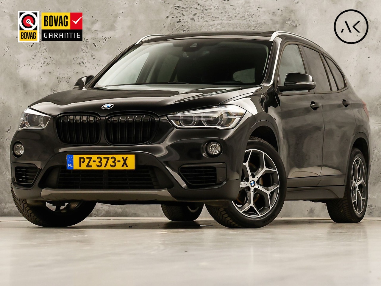 BMW X1 - sDrive18i Sport High Executive 140Pk Automaat (PANORAMADAK, GROOT NAVI, MEMORY SEAT, LEDER - AutoWereld.nl