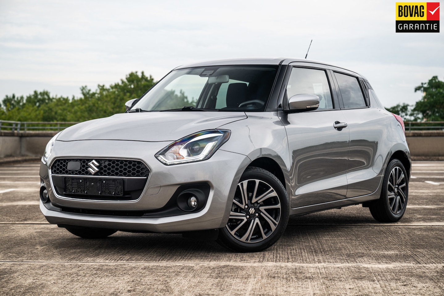 Suzuki Swift - 1.2 Style Smart Hybrid |Automaat | Airco/Clima | Adaptive Cruise Control | Camera | Naviga - AutoWereld.nl