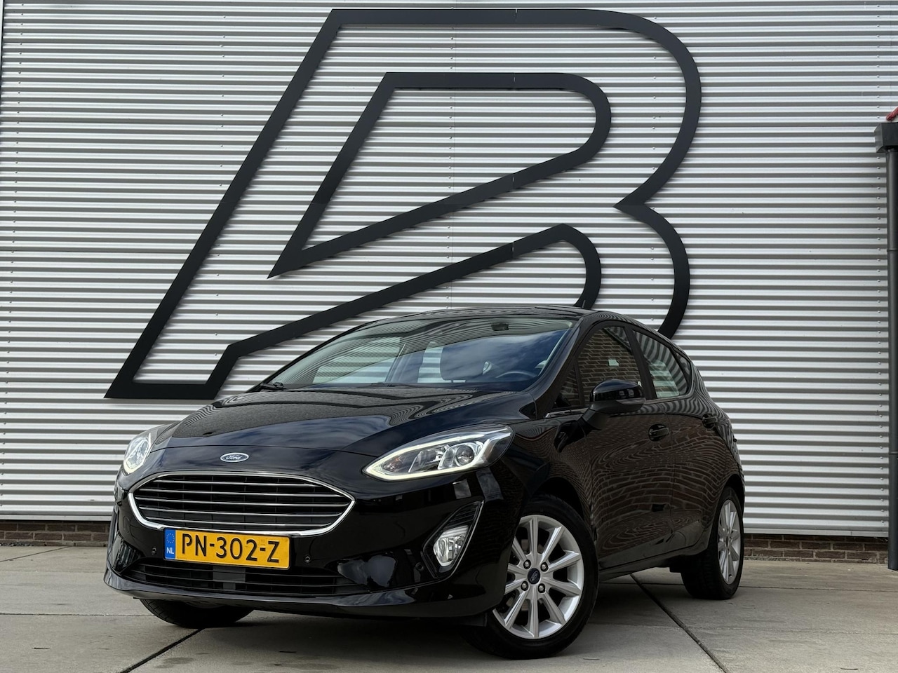 Ford Fiesta - 1.0 EcoBoost Titanium 2e Eigenaar|Navi|Camera|Clima|Cruise|PDC|B&O Sound System|N.A.P|APK - AutoWereld.nl