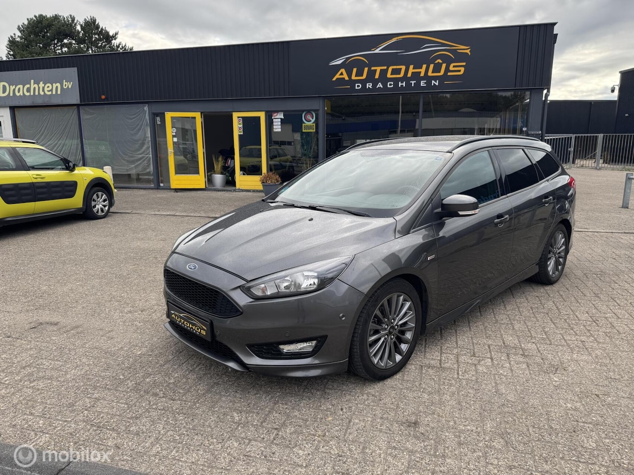 Ford Focus Wagon - 1.0 ST-Line navi cruise lm velgen 112155 km - AutoWereld.nl