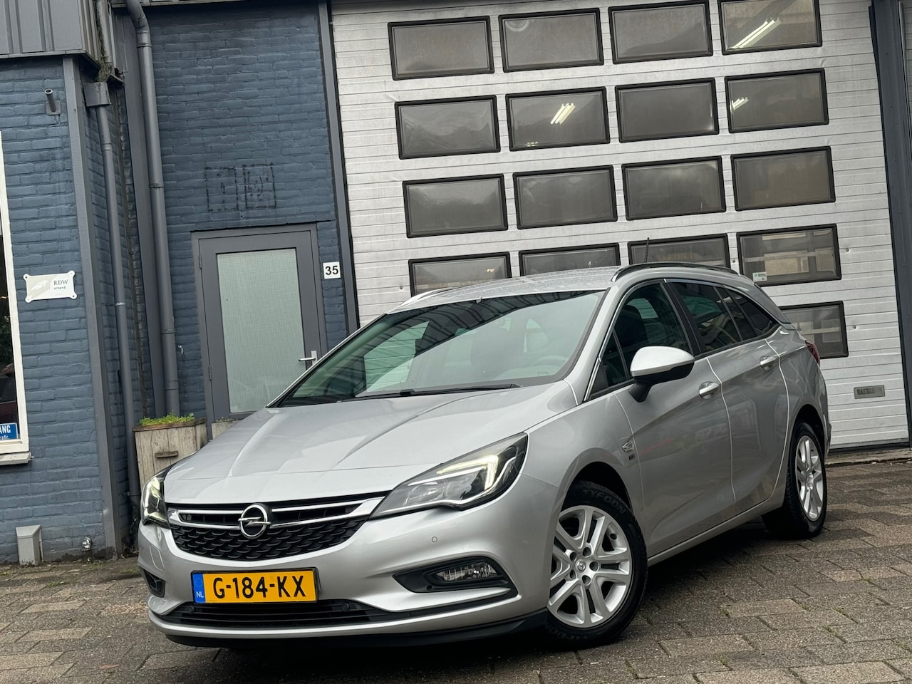 Opel Astra Sports Tourer - 1.0 Turbo 120 Jaar Edition| Clima | Camera | Cruise | N.A.P - AutoWereld.nl