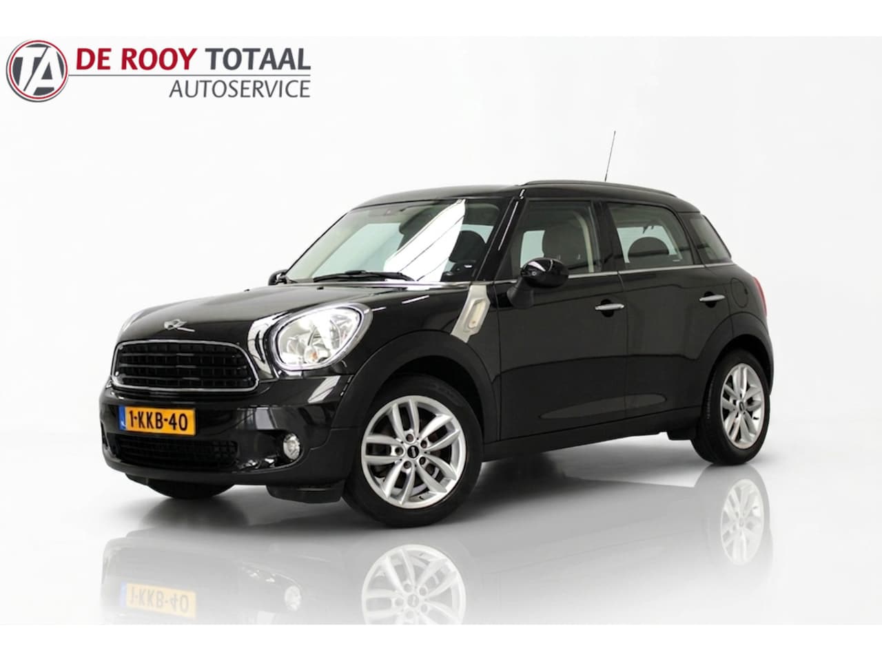 MINI Countryman - 1.6 One Holland Street 98PK, HALF LEER | NAVIGATIE | CRUISE | PARKEERSENSOREN - AutoWereld.nl