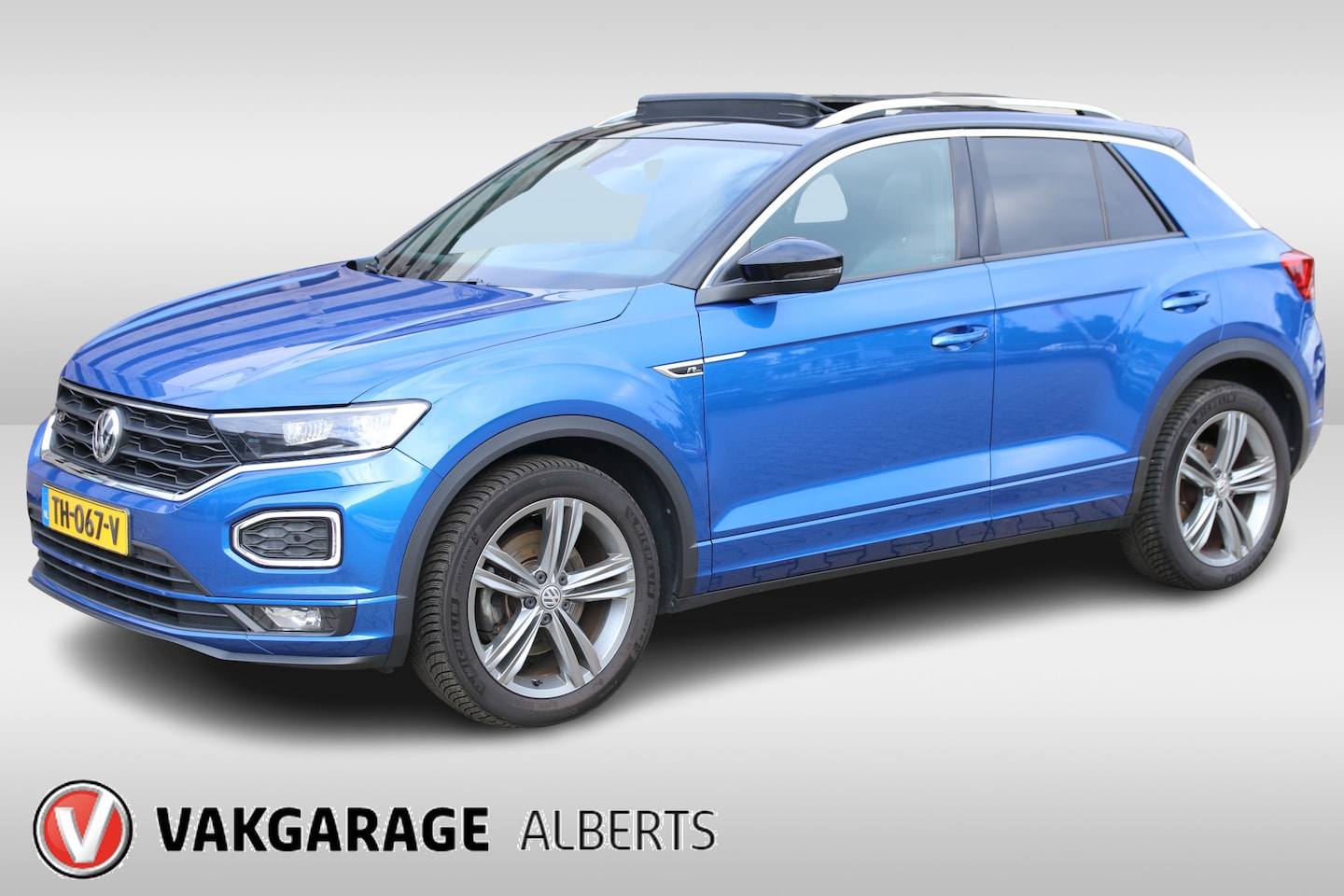Volkswagen T-Roc - 1.5 TSI Sport / Navi / Climate / Stoelverwarming / R Line - AutoWereld.nl