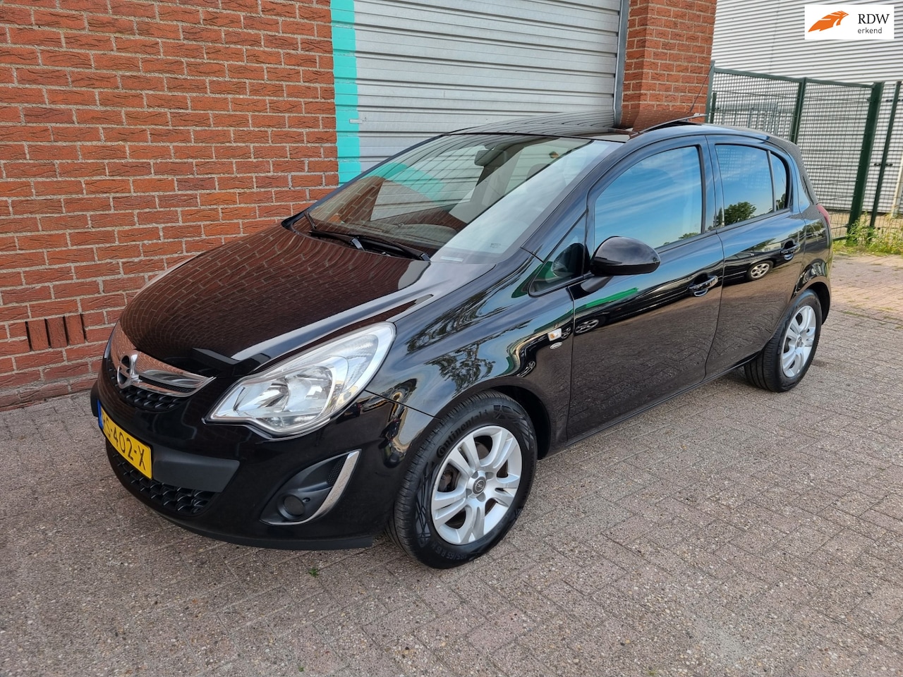 Opel Corsa - 1.4-16V 5-Drs Airco! Panoramadak! Bj:2011 - AutoWereld.nl