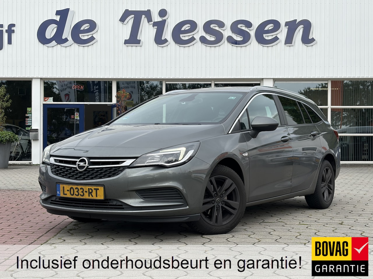 Opel Astra Sports Tourer - 1.0 Turbo 120 Jaar Edition | Camera | Navi | Cruise | Rijklaar met beurt & garantie! - AutoWereld.nl