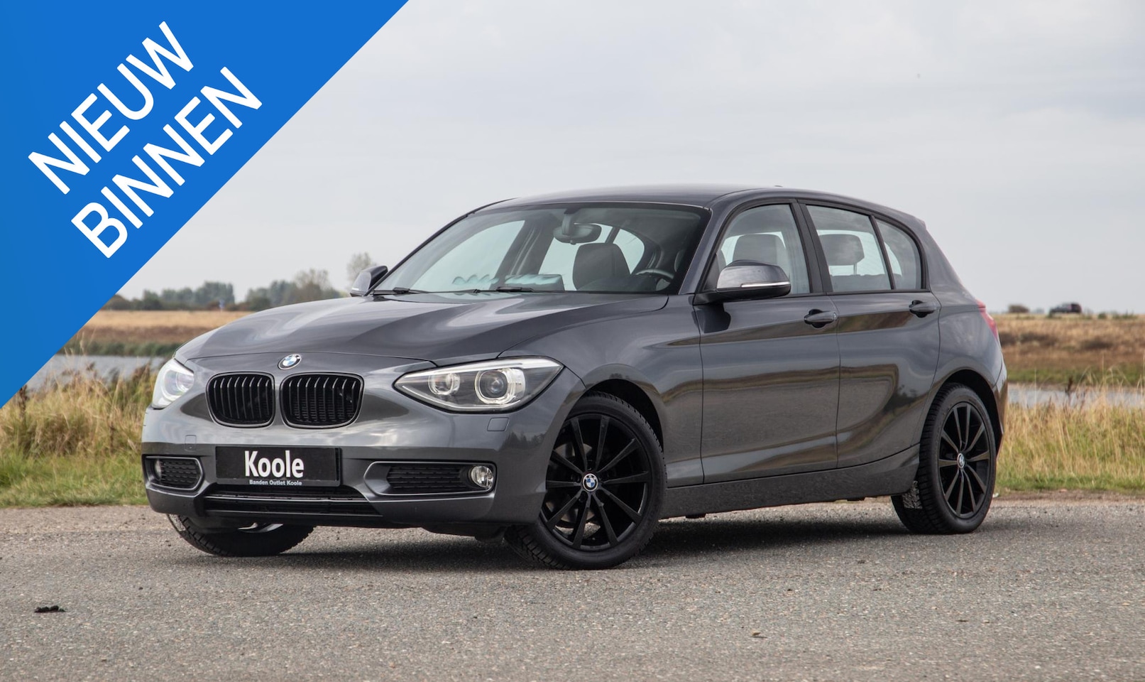 BMW 1-serie - 116i Business+ AUTOMAAT / CRUISE CONTROLE / BLACK LINE / AIRCO / CARPLAY / URBAN - AutoWereld.nl