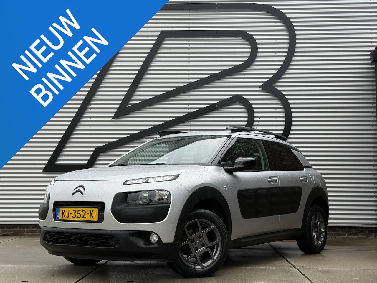 Citroën C4 Cactus - 1.2 PureTech Shine 2e Eigenaar|Navi|Camera|PDC|Trekhaak|Clima|Cruise|D-riem vv in 2023|N.A - AutoWereld.nl