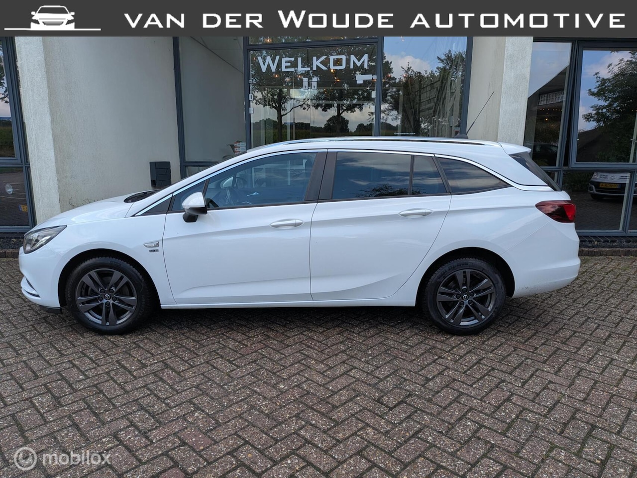 Opel Astra Sports Tourer - 1.0 Turbo 120 Jaar Edition 1.0 Turbo 120 Jaar Edition - AutoWereld.nl