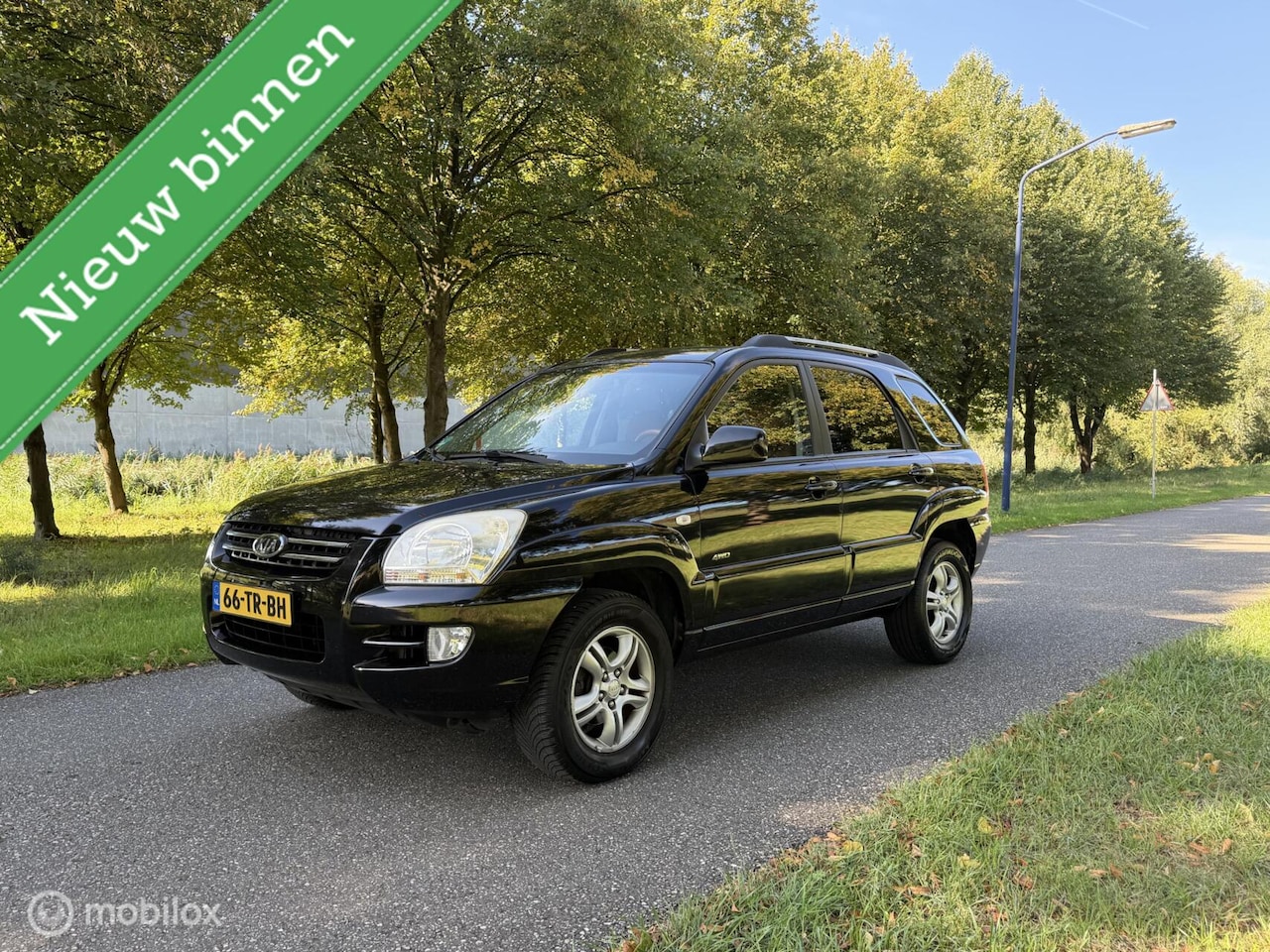 Kia Sportage - 2.7 V6 M-bition 4WD*AUTOMAAT*LEDER*APK 04/27 - AutoWereld.nl