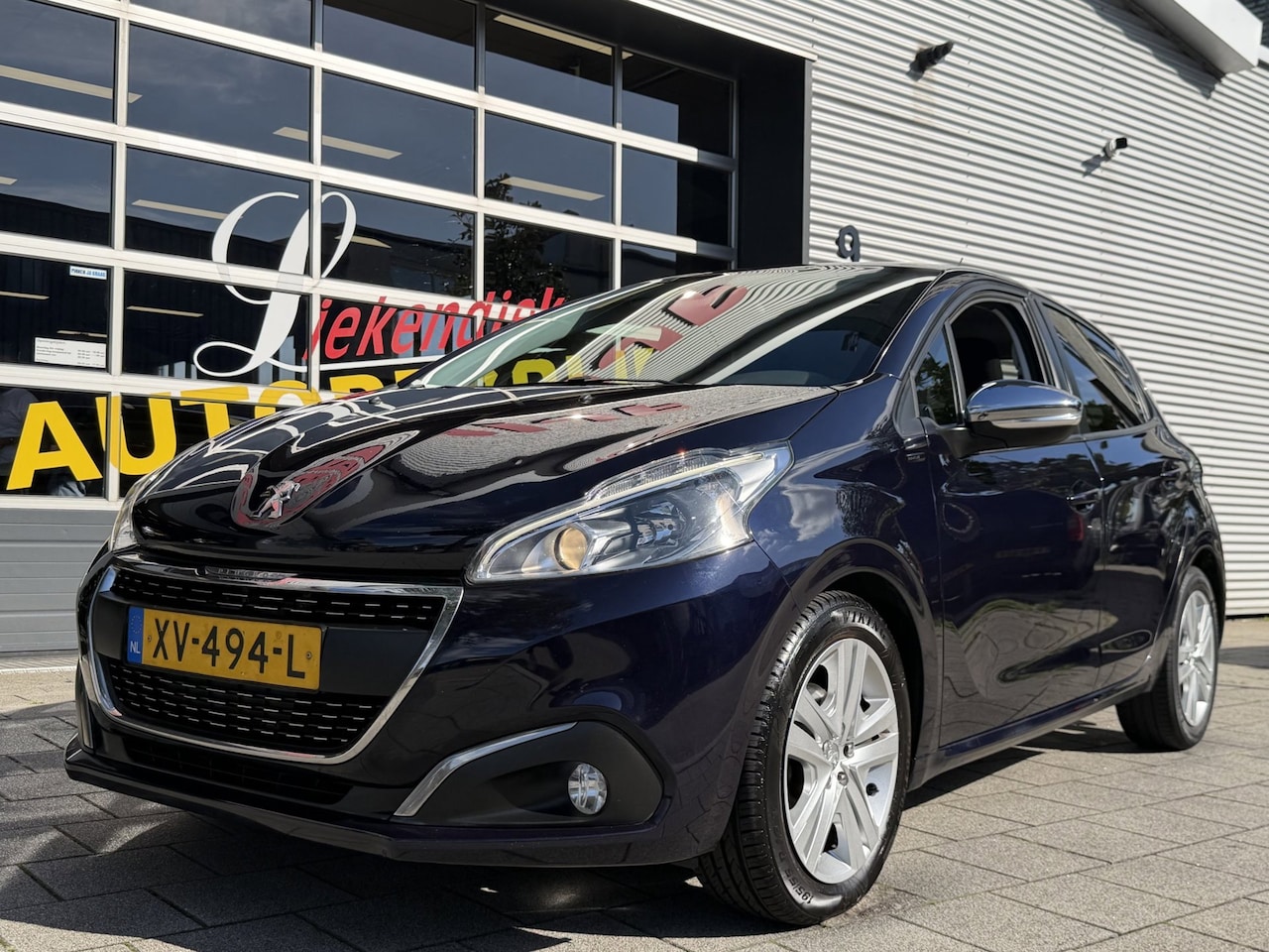 Peugeot 208 - 1.2 PureTech Signature - Navigatie I Airco I LED I PDC I Comfort pakket I Dealer onderhoud - AutoWereld.nl